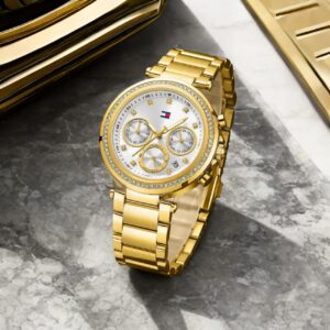 Indulge in elegance with this exquisite Tommy Hilfiger Gold ladies’ watch — a true statement piece that effortlessly merges refined design with modern flair.